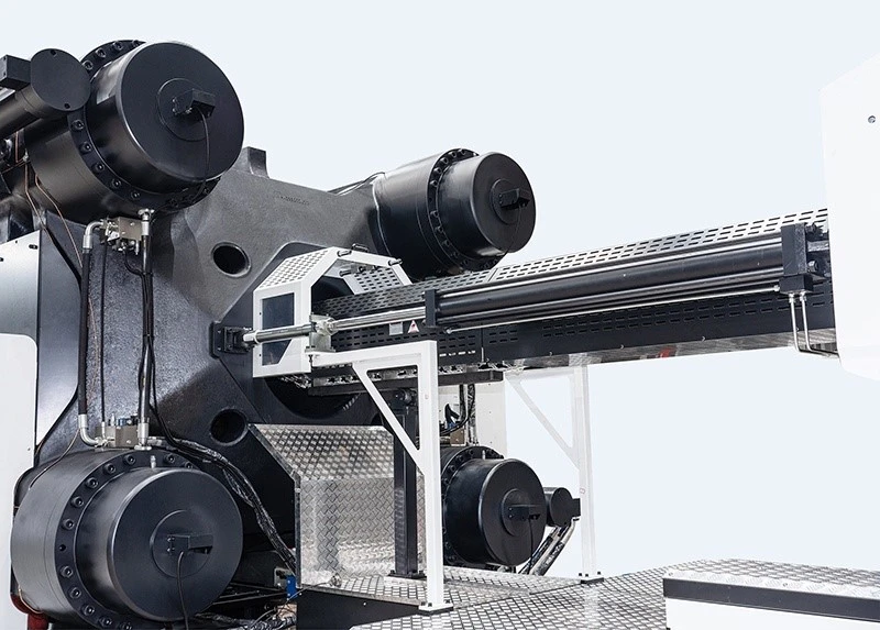 Injection barrel and cylinder housings viewed from the rear of a DU machine