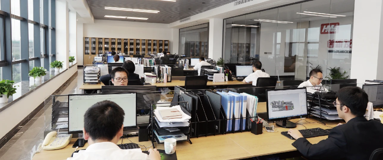 HWAMDA engineers at design workstations