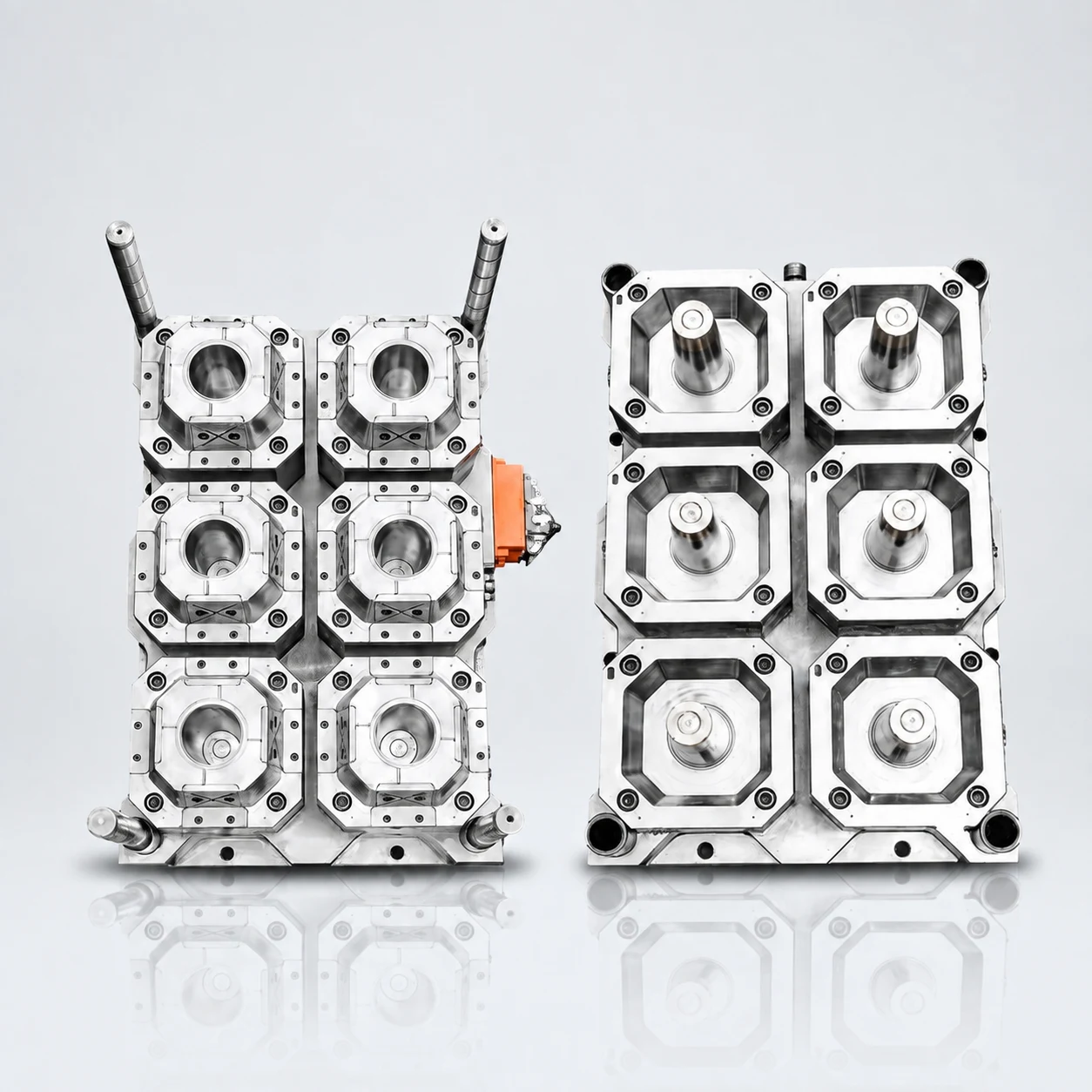 Opened multi-cavity plastic cup injection mold showing cavity and core sides
